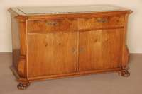 Sideboard, deutsch, um 1928/30, im Renaissancestil, Korpus Hartholz, kaukasisch Wurzelnußfurnier, z.T. gespiegelt verlegt, reich reliefiert, ...