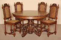 Tischgruppe, Frankreich, um 1870, Eiche massiv, sparsame furniert, bestehend aus Tisch und 4 StÜhlen, reich geschnitzter Tischfuß in Form von 4 ...
