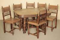 Ausziehtisch und sechs Stühle, Frankreich/Dijon, um 1890, Tisch Nußbaum massiv, Nußbaumfurnier, Untergestell stiltypisch mit Wangen und ...