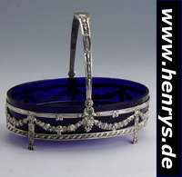 Henkelanbietschälchen, deutsch um 1900, 800er Silber, blauer Glaseinsatz, um- laufender Girlandendekor, Henkel umklappbar, ca. 5 x 17 x 12.5 cm