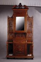Garderobe, Holland, um 1880, Eiche mass. Rahmen m.Flachschnitzereien, Füllungen m. aufgelegten Schnitzereien, facett. Spiegel- Einsatz, ...