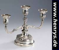 3-flammiger Kerzenleuchter, Mexiko, 925er Silber, abstrakt floraler Rosendekor, z.T. erhaben, schwere, massive Ausf., H. ca. 21 cm,B. ca. 27 cm, ca. ...