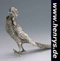 Tischdekoration in Form eines Fasans, Mexiko, 925er Silber, schwere massive Ausf., naturalistische Darstellung, H ca. 22 cm, L. ca. 33 cm, ca. 1130 g