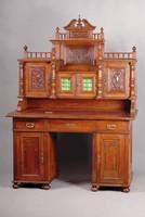 Gründerzeitschreibtisch, deutsch, um 1890, 2-teilig, 3-schübig, Seitenteile m. einfacher Inneneinrichtung, Front vielfach gerillt, sparsame ...