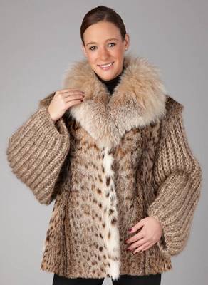 Luchsjacke mit Wollärmeln, Gr. ca. 42, braunes Innenfutter, Kragen aus Fuchsfellen, Ärmel grob gestrickt und dick wattiert, 2 seitl. ...