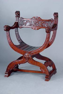 Scherenstuhl, deutsch, um 1880, Eiche massiv, scherenförmig aufgebaut und verstrebt, reich geschnitzt, st. Gebr.-Sp., alt belassen, ca. 94x69x55 cm, ...