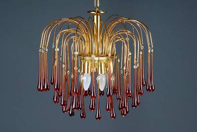 Deckenlampe, 2.H.20.Jh., reicher Behang von bernsteinfarbenen Tropfen, 5 Brennstellen, H.ca.44cm, Fu.nicht gepr., l.Alterssp.
