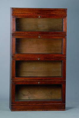 Bibliotheksschrank, deutsch um 1910, 4- teilig, Hartholz massiv, aufeinandersetzbar, alle Teile verglast, einzeln aufklappbar, sehr praktisch, ...