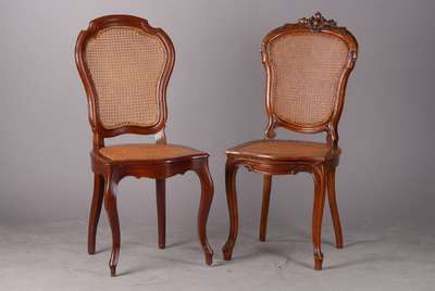 6 Stühle (5 Stühle+1), um 1860/70, Nußbaum, reich geschnitzt, dazu 1 Stuhl, Mahagoni, passend aber nicht dazugehörig, Sitz und Rückenfläche m. ...