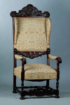 Ohrenbackensessel, um 1870/80, Nußbaum, Rücken und Sitzfläche mit Bezug und Polsterung, diese alt belassen, reiche Akanthusblattschnitzerei, ...