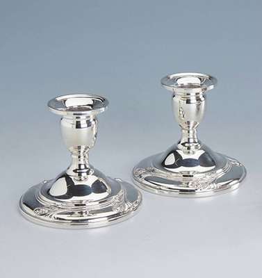 Kerzenleuchterpaar, Amerika, 925er Silber, gefüllt, abstr.-floral verziert, H ca. 10 cm