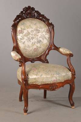 Lehnsessel, um 1860/70, Mahagoni massiv u. furniert, allseitig geschweift u. gerieft, ovale Rückenlehne mit asymmetrischer Akanthusblattbekrönung, ...