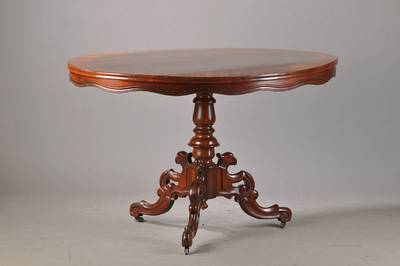 Louis-Philippe-Tisch, um 1870/80, ovale Platte mit Pyramidenmahagonifurnier u. gewellter Zarge, Balusterschaft, geschweifter Dreifuß mit ...