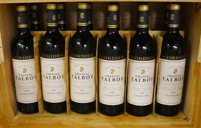 12 Flaschen 1986 Chateau Talbot, top shoulder u. besser, je ca. 75 cl, in Originalholzkiste, sehr guter Erhaltungszustand, selten im Angebot, ...