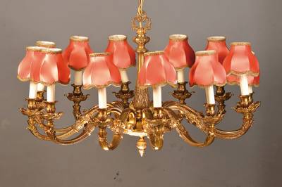 Großer Prunkleuchter im Barockstil, sog. Schröder-Lampe, deutsch, 60er Jahre, massive Bronze, 12-flammig, geschwungene Arme mit Rocaillen-Dekor, ...