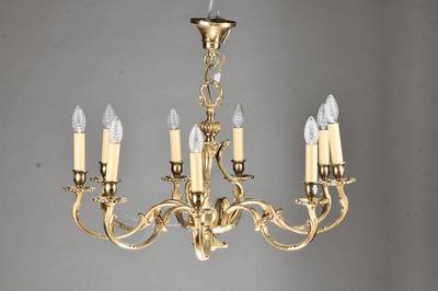 Bronzelüster, deutsch, um 1960/70, Bronzeguß massiv, im Rokoko-Stil, 9 geschwungene Ausleger mit je einer Brennstelle, sparsame ...