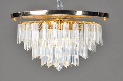 Deckenlampe, Murano, wohl Venini, 2. Hälfte 20. Jh., Messing vergoldet, 5 Brennstellen, schwerer vierpassiger Kristallbehang, an den Enden ...