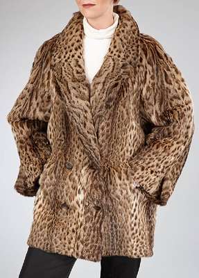 Leopardkatzenjacke, Gr. ca. 38, (Felis bengalensis chinensis), längsverarbeitete Felle, Ärmel mit Manschetten, Reverskragen, 2 seitliche ...