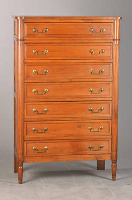 Schubladenkommode, sog. Semaniere, wohl Frankreich, um 1870, Kirschbaum, vordere Stollen als 3/4-Säulen ausgearbeitet u. kanneliert, 7-schübig, ...