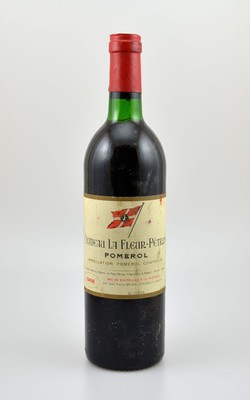 1 Flasche 1986 Chateau La Fleur-Petrus, Pomerol, ca. 75 cl, Füllstand: ca. top shoulder, Kapsel l. besch., Etikett beschmutzt, unverkostet, ...