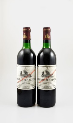 2 Flaschen 1986 Chateau Beychevelle, Saint-Julien, je ca. 75 cl, 12,9 % Vol., Füllstände: top shoulder, Etiketten l. beschmutzt, unverkostet, ...
