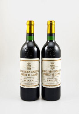 2 Flaschen 1985 Chateau Pichon Longueville Comtesse de Lalande, Pauillac, Grand Cru Classe, je ca. 75 cl, 12,5 % Vol., Füllstände: je ca. into ...