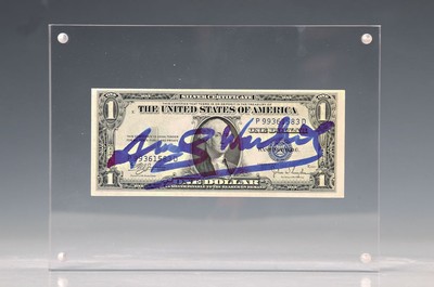 Andy Warhol, 1928-1987, "Dollar", zwischen plexiglas, dieser mit Magnet befestigt, sign., ca. 6,5x15,5 cm, gesamt ca. 15x20 cm, mit ...