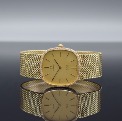 OMEGA De Ville Herrenarmbanduhr in GG 585/000 mit Diamanten, Schweiz um 1980, quarz, 2- teil. Gehäuse, Boden aufgedr., Lünette aufw. m. Diamanten ...