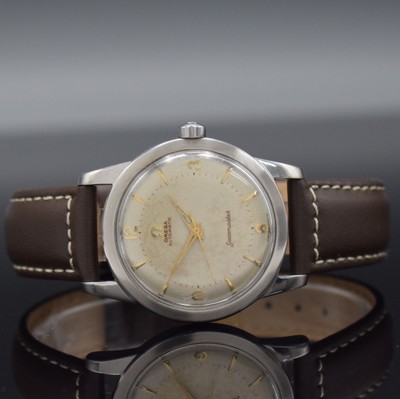 OMEGA Seamaster Herrenarmbanduhr, Schweiz um 1952, Ref.-Nr. C2577-2, Hammerautomatik, Edelstahl, Boden m. Widmung geschr., silb. Zifferbl. m. gold. ...