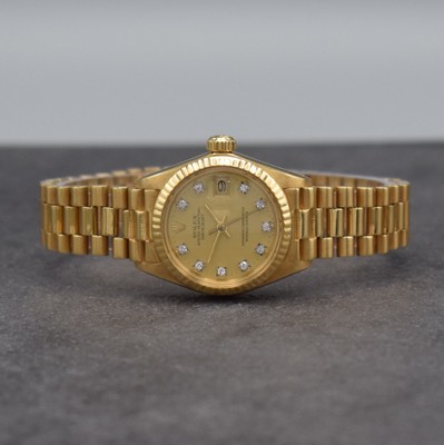 ROLEX Datejust Damenarmbanduhr in GG 750/000, Schweiz um 1980, Automatik, Ref. 6917, verschr. Oystergehäuse inkl. Presidentband m. Faltschl., gold. ...