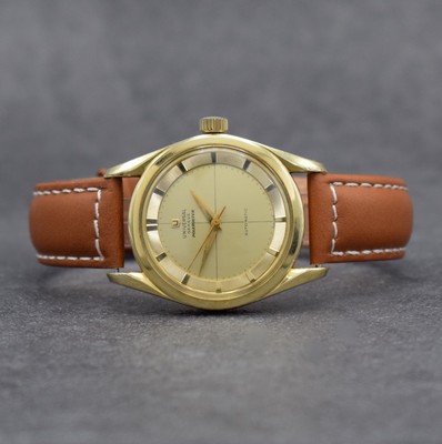 UNIVERSAL GENEVE Polerouter Herrenarmbanduhr, Schweiz um 1955, Hammerautomatik, Edelstahlgeh. m. Goldhaube, Boden geschr., gold. Zifferbl., gold. ...