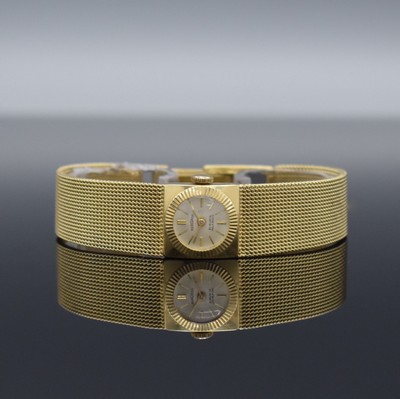 BERGANA Damenarmbanduhr in GG 585/000, Handaufzug, Schweiz um 1960, Boden aufgedr., silb. Zifferbl. altersbed. fl., Werk rotverg., 21 St., ...