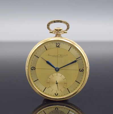 IWC offene Taschenuhr Kaliber 73 in GG 585/000, Schweiz um 1930, Münzrand mittig floral grav., Metallcuvette, gold. Zifferbl. m. arab. Zahlen ...