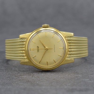 TISSOT Herrenarmbanduhr in GG 585/000 an original Milanaiseband, Automatik, Schweiz um 1960, verschr. Boden m. starken Rep.-Spuren, gold. Zifferbl. ...