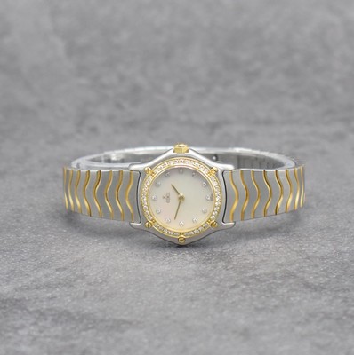 EBEL Damenarmbanduhr Classic Wave, Schweiz um 1995, Ref. 1057902, Edelstahl/Gold kombiniert inkl. Wellengliederband, 5-fach verschr. Lünette wie ...