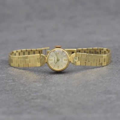 ANKER Damenarmbanduhr in GG 585/000, Handaufzug, Schweiz 1960er Hare, Boden aufgedr., silb. Zifferbl. altersbed. fl., Anz. v. Std. & Min., 17 St., ...