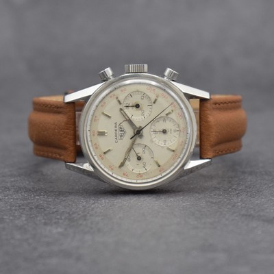 HEUER Carrera Schaltradchronograph, Schweiz 1960er Jahre, Edelstahl, Boden geschr., neutr. Krone, silb. Zifferbl. m. aufgel. Indizes altersbed. ...