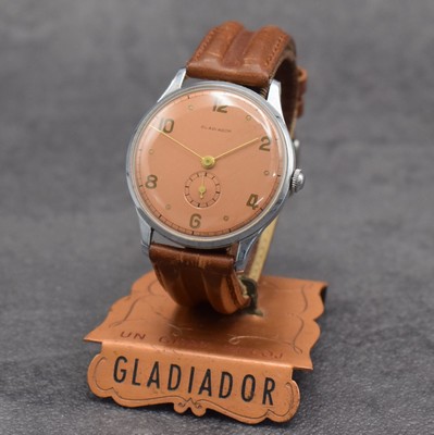 GLADIATOR große 38 mm Herrenarmbanduhr mit original Aufsteller, Schweiz um 1940, Handaufzug, 3-teil. Gehäuse verchr., Stahlboden aufgedr., sehr ...
