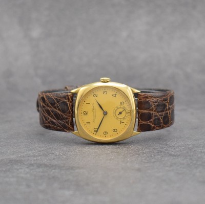 IWC frühe Armbanduhr in GG 750/000, Schweiz um 1928, Handaufzug, Carré-Cambré Scharniergeh., Lünette aufgedr., matt gold. Zifferbl., arab. ...