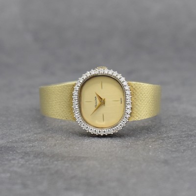 BULOVA Damenarmbanduhr in GG 585/000, Schweiz um 1965, Handaufzug, 2-teiliges Geh., Boden aufgedr., Lünette aufwend. mit Diamanten (in WG) bes. zus. ...