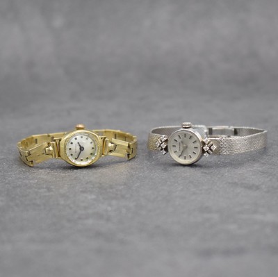 BIFORA & NORVINA 2 Damenarmbanduhren in GG/WG 585/000, Schweiz/Deutschland um 1970, Handaufzug, gedr. Böden, silb. Zifferbl. mit aufges. Std.-Ind., ...