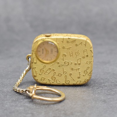 REUGE Miniatur-Spieluhr mit integrierter Uhr an Kette, Schweiz um 1960, klassische Melodie, verg. Gehäuse beids. guill. & mit Notenschlüsseln ...