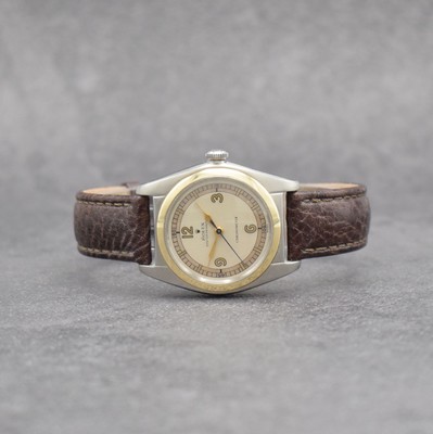 ROLEX Chronometer Herrenarmbanduhr Oyster Perpetual Bubble Back in Stahl mit Goldlünette Referenz 4392, Automatik, Schweiz um 1949, Lederband m. ...