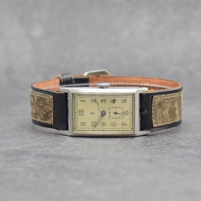 UHRENFABRIK GLASHÜTTE SA Herrenarmbanduhr im Edelstahl Scharniergehäuse, Deutschland um 1935, Handaufzug, silb. Zifferbl. m. arab. Leuchtzahlen ...