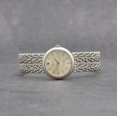 ROLEX Cellini Damenarmbanduhr in WG 585/000, Schweiz 1970er Jahre, Handaufzug, Glasrand aufgedr., Kettenglieder-Band in WG 585/000, silb. Zifferbl. ...