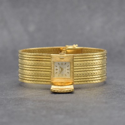 ROLEX seltene Damenarmbanduhr in Bandform, Schweiz um 1960, Handaufzug, GG 750/000, v. Gehäuse ins Band übergehendes Design m. aufklappbarem ...