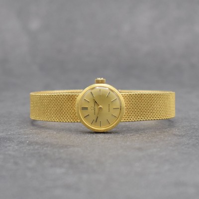 ETERNA Sahida Damenarmbanduhr in GG 750/000, Schweiz um 1965, Automatik, gedr. Geh. am orig. Milanaiseband, orig. Krone & Glas, gold. Zifferbl., ...