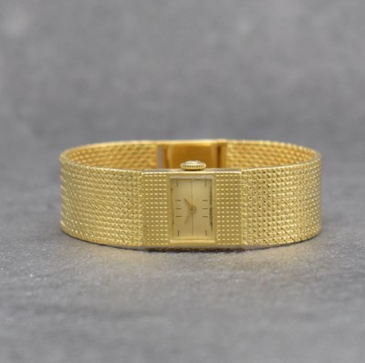 UNIVERSAL GENEVE Damenarmbanduhr in GG 750/000, Schweiz um 1965, Handaufzug, rechteck. Geh. m. anges. Pyramiden- Milanaiseband, Boden aufgedr., gold. ...