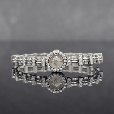 Jaeger-LeCoultre ausgefallene, Diamantbesetzte Damenarmbanduhr in WG 750/000, Schweiz um 1945, Handaufzug, 2-fach verschr. Geh. m. rückseitiger ...