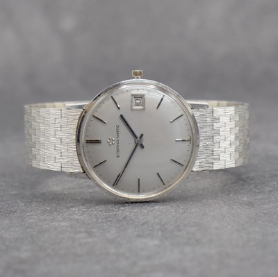 ETERNA-MATIC Herrenarmbanduhr in WG 750/000, Schweiz um 1965, Automatik, Boden aufgedr., inkl. Band in WG 750/000, silb. Zifferbl. m. aufges. ...